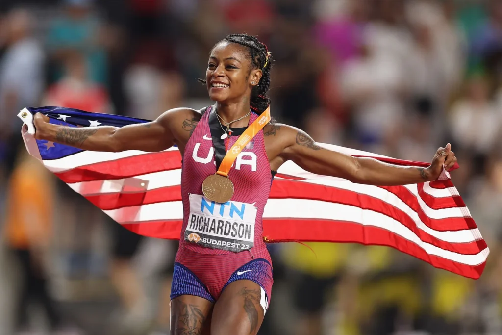 team-usa-american-track-and-field-athlete-sha-carrie-richardson-celebrates-win-for-womens-100-meter-final-day-3-at-world-athletics-championships-budapest-2023