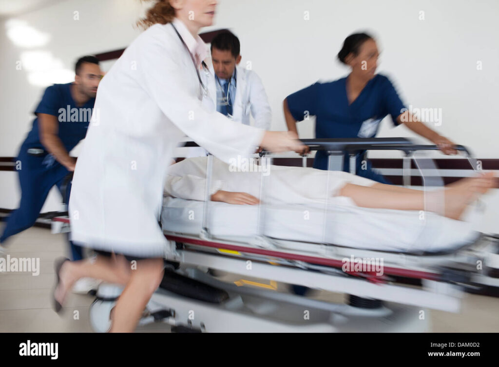 hospital-staff-rushing-patient-to-operating-room-DAM0D2