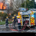 firemen-from-the-welsh-fire-service-attend-a-fire-at-a-derelict-house-DYME90